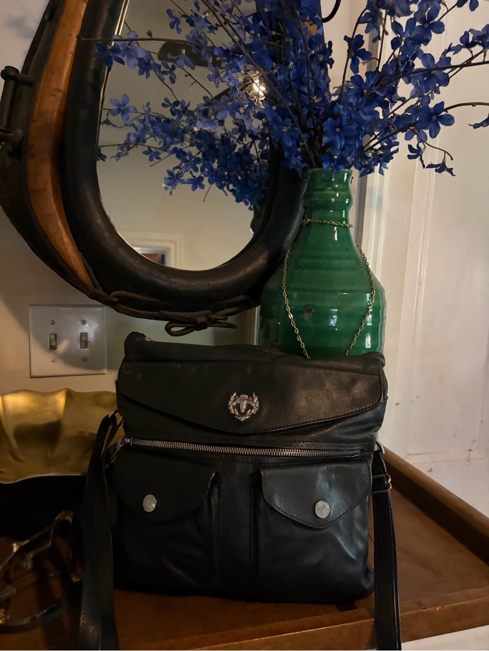 RUDSAK Black Leather Crossbody with Front Pockets and Emblem